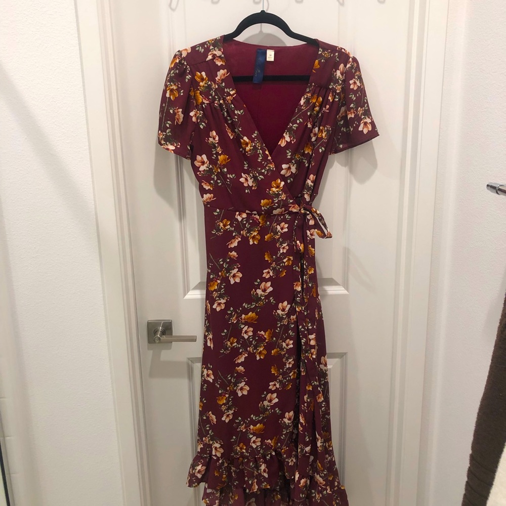 Burgundy floral true wrap high-low midi dress.
